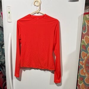 SKIMS orange long sleeve crew